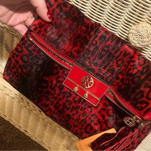 Brand new Tory burch purse very nice and made out of real fur it’s super soft!